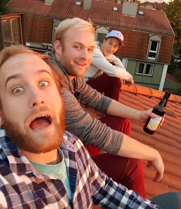 Intern Teddy enjoying friends and beers.