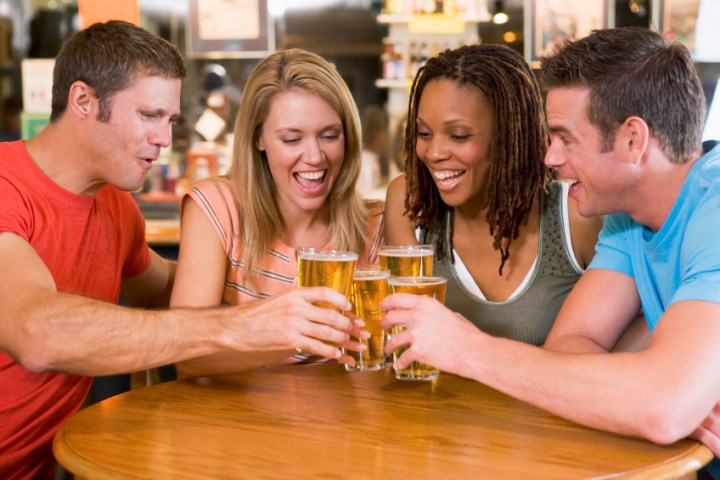 Friends drinking beer on a Beer Train Trolley Tour in San Diego