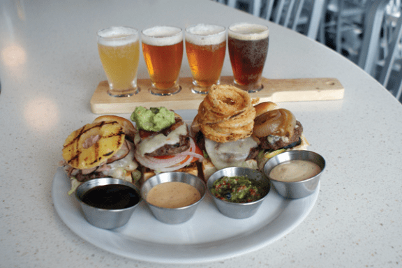 a plate of food and a cup of coffee